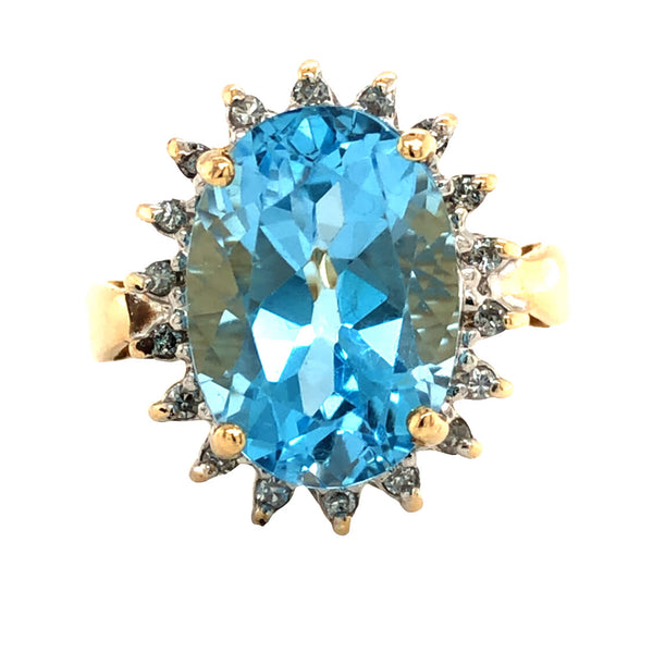 Large, Oval-Cut Blue Topaz and Diamond Halo Ring