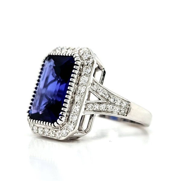 Elegant Emerald-Cut Tanzanite & Diamond Halo Ring