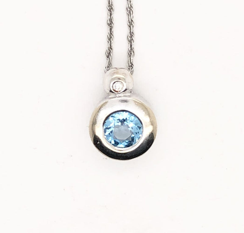 Delightful Blue Topaz Pendant & Diamond Accent