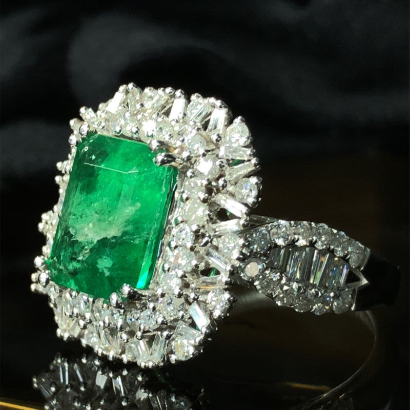 Emerald Ring with Round and Baguette Diamond Halo