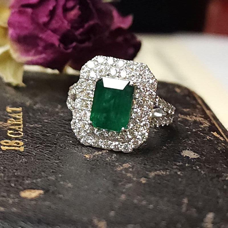 Designer Emerald Ring with Tiered Diamond Halo