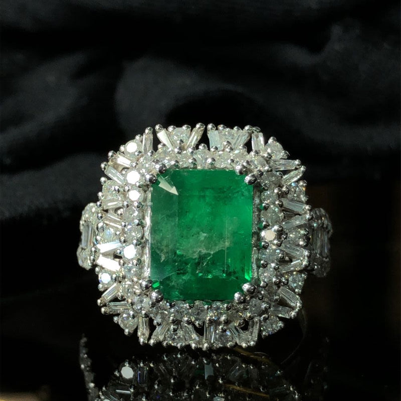 Emerald Ring with Round and Baguette Diamond Halo