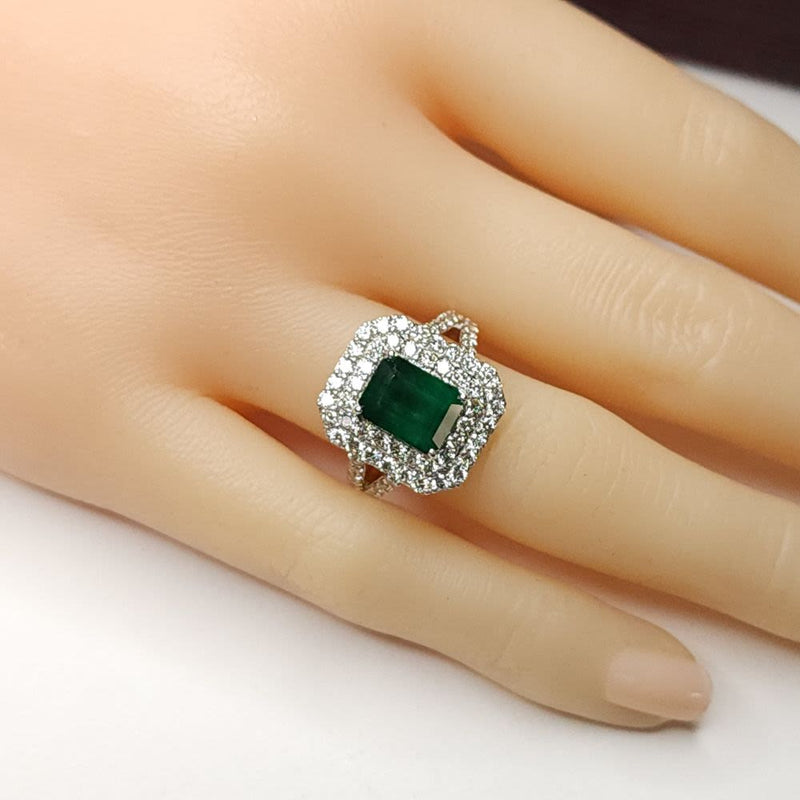 Designer Emerald Ring with Tiered Diamond Halo