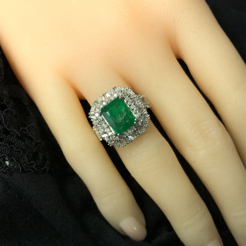 Emerald Ring with Round and Baguette Diamond Halo