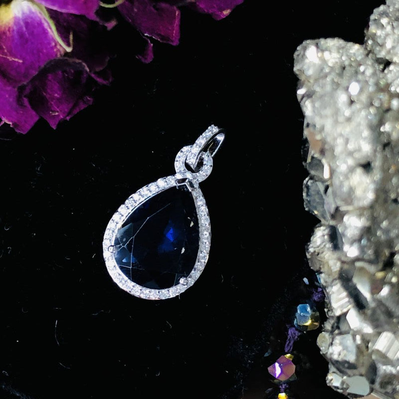 Glamorous Iolite and Diamond Halo Pendant